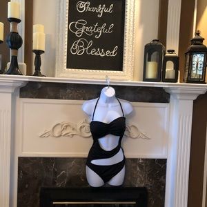 Black one piece with cut out outs